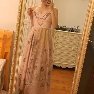 Prom maxi sleeves tulle lace dress with lots of embellishments and embroideries.